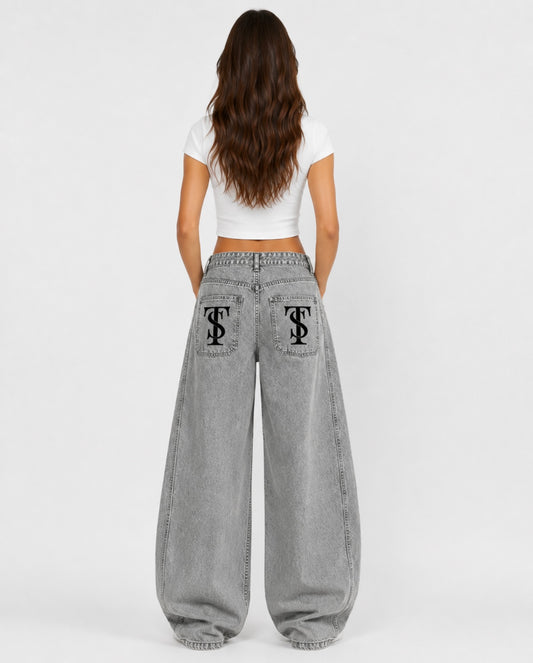 WASHED CURVED BLADE DENIM JEANS